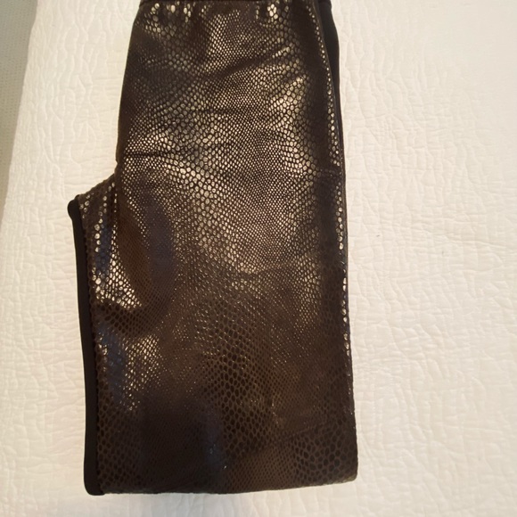 Brown snakeskin print pants with nylon backing. - Picture 3 of 4